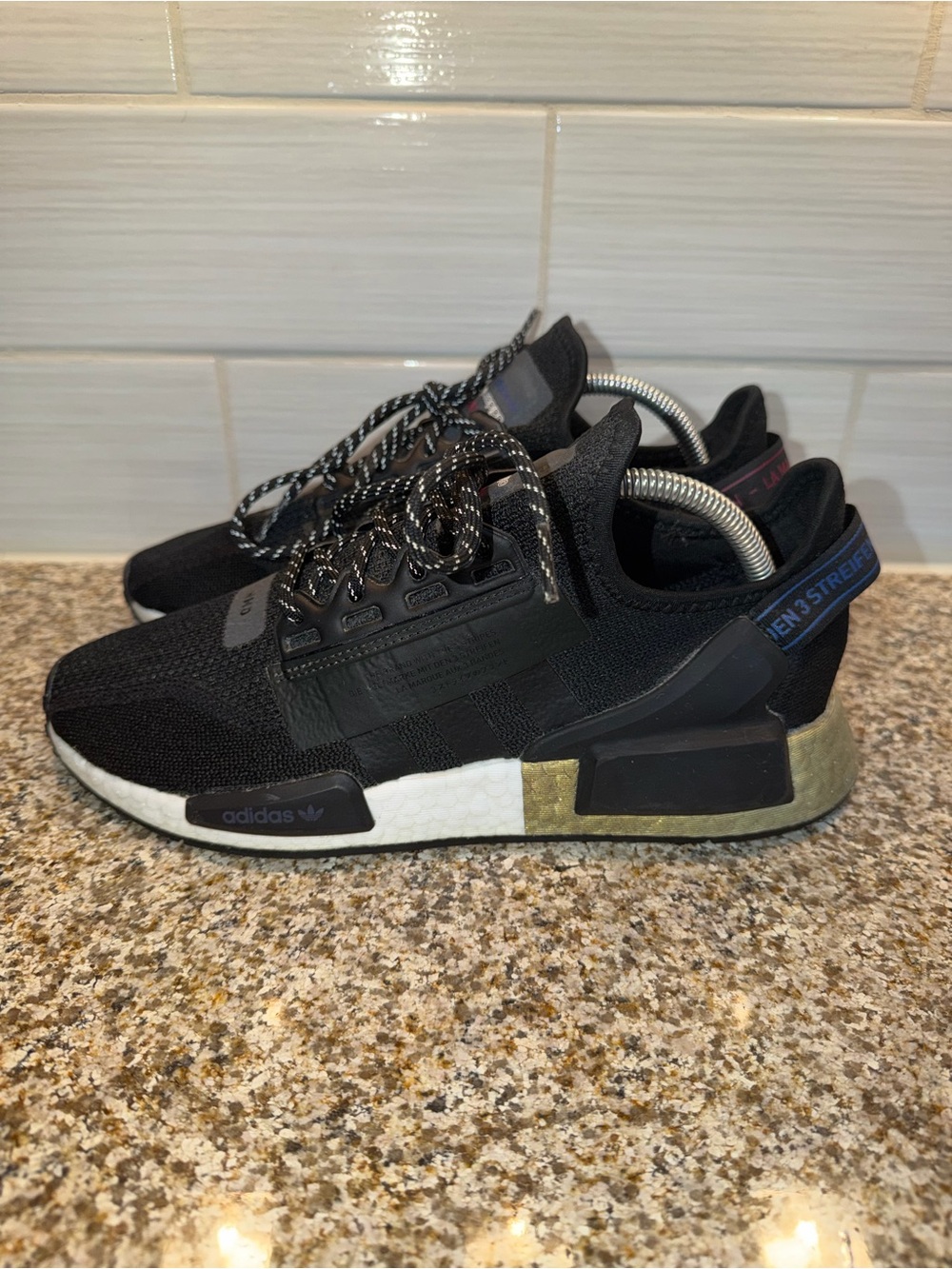 adidas Black Knit Sneakers with Gold and Blue Accents